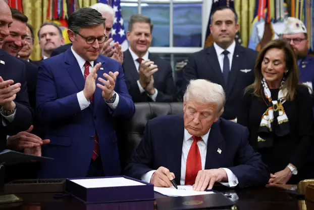 U.S. President Trump signs the funding bill to end the government shutdown, in Washington, D.C.